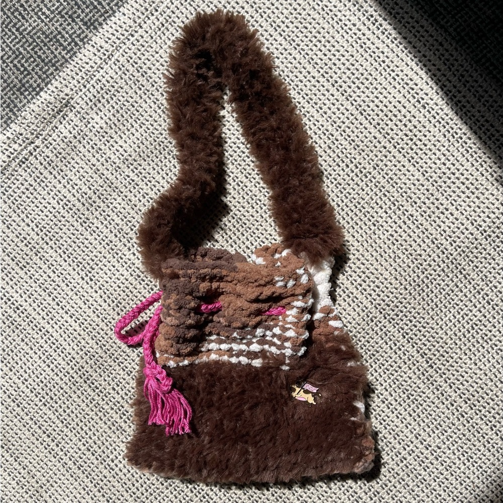 Hand knitted mini purse made by me